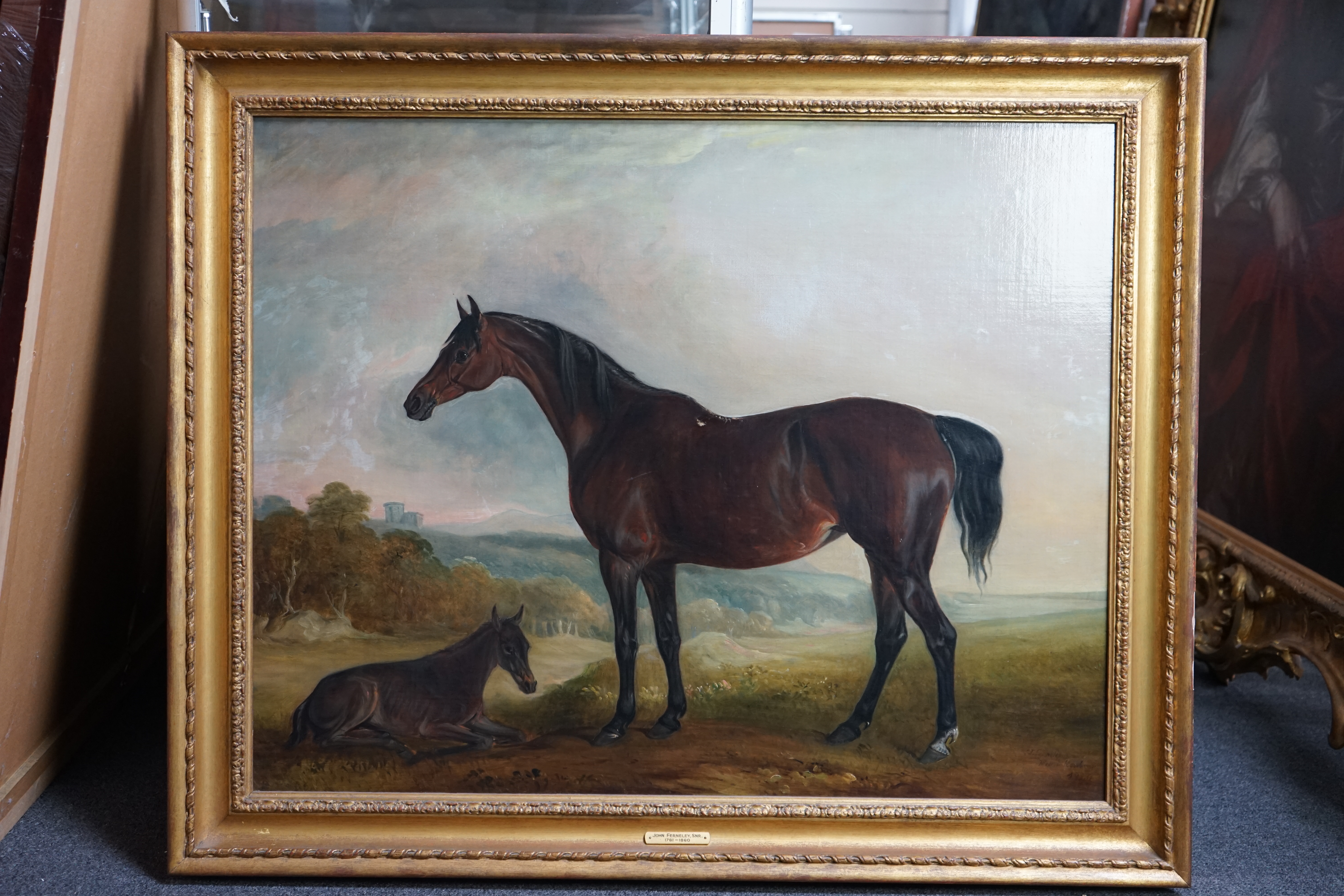 John Ferneley Snr. (British, 1781-1860), Portrait of a bay mare and foal in a landscape, oil on canvas, 70 x 89cm